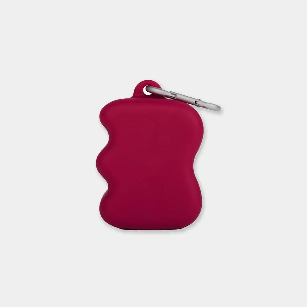 Distributeur de friandises en silicone à presser bordeaux